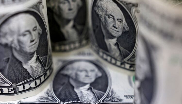 Dollar hovers near seven-month lows after jobs data